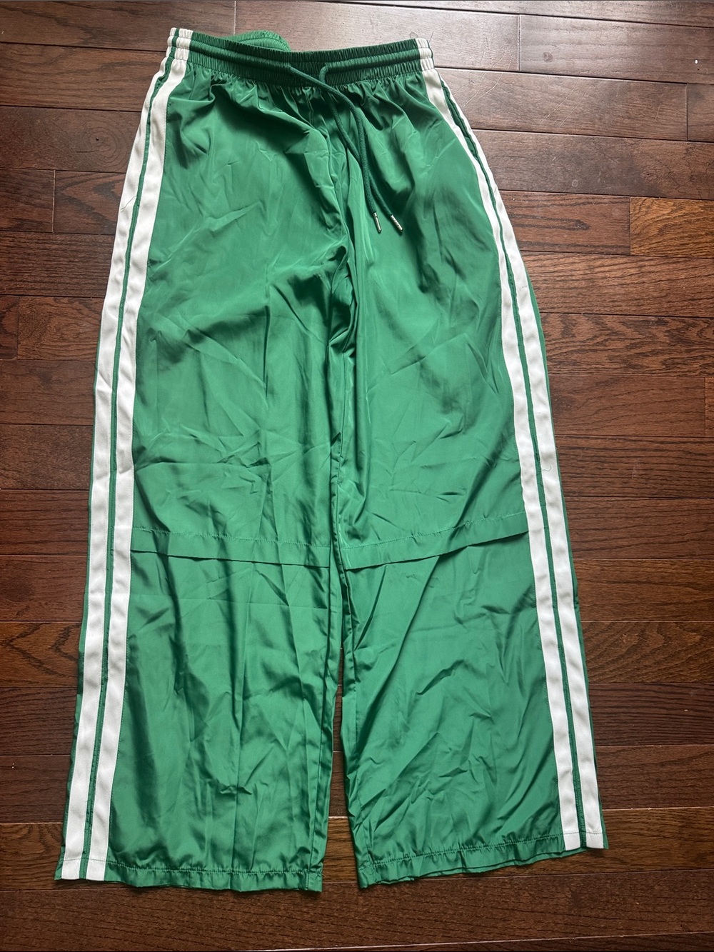 Edikted nylon green track pant with white stripes on sides